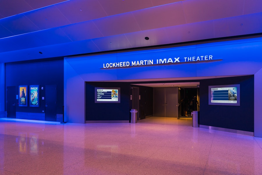 The glowing blue entrance to the Lockheed Martin IMAX Theater inside the museum.