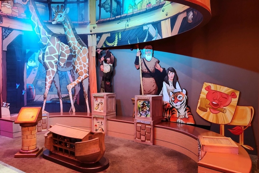Colorful Noah’s Ark children’s exhibit at the Museum of the Bible with cartoon animals and interactive play stations.